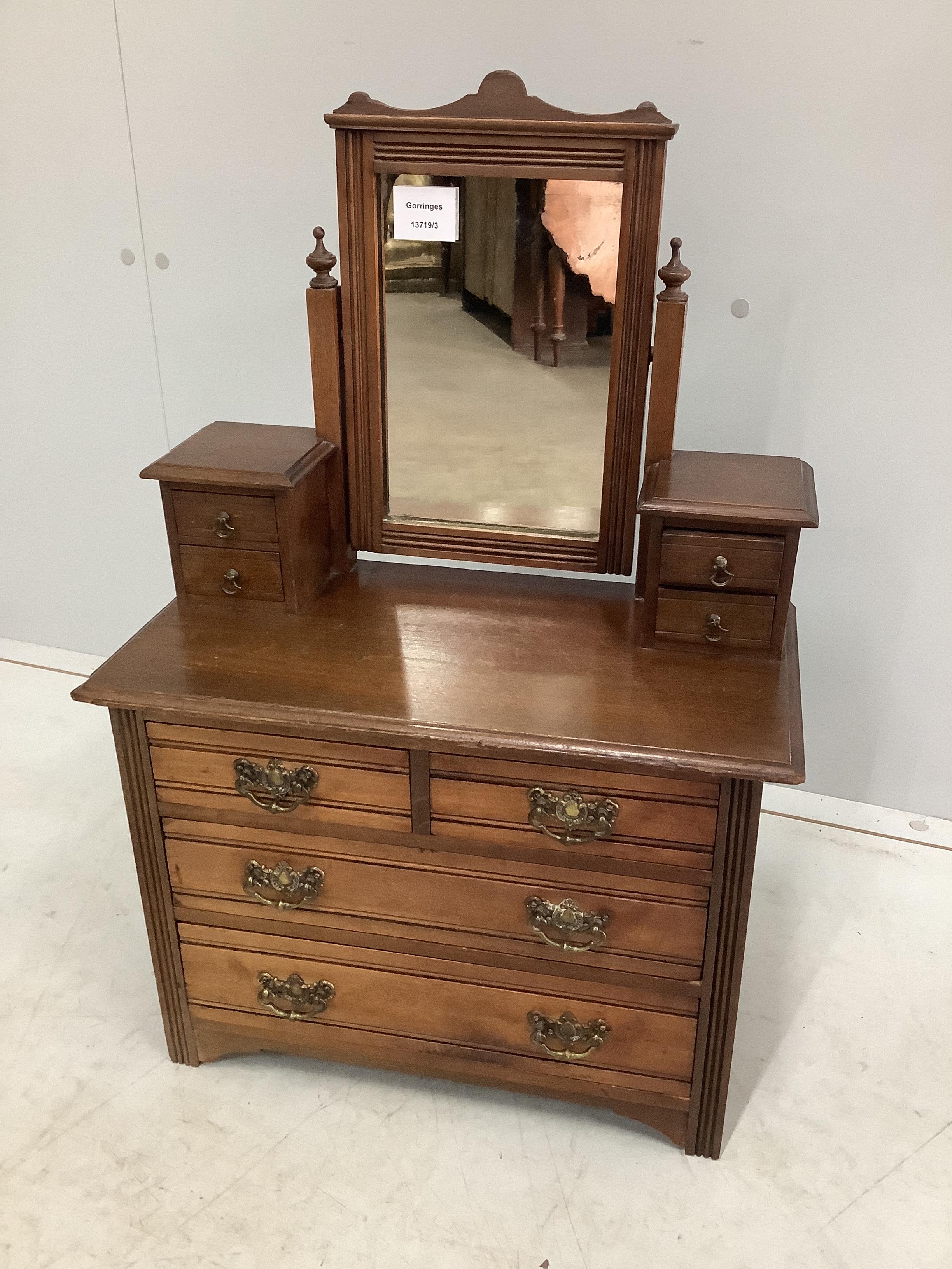 An early 20th century beech miniature dressing chest, width 43cm, depth 22cm, height 64cm